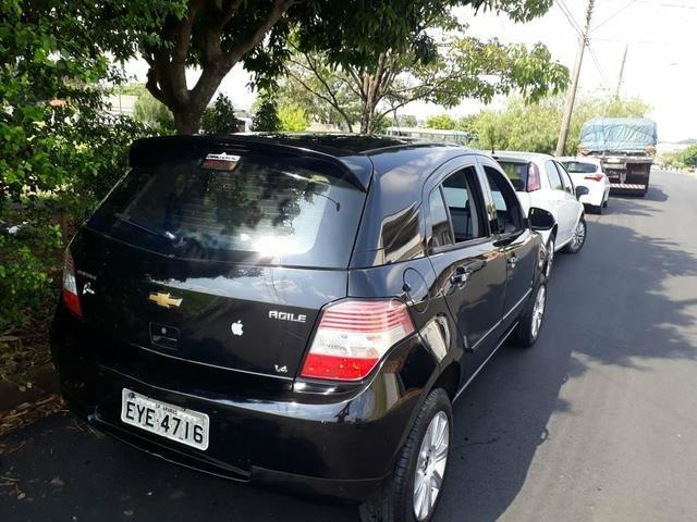 Vende-se Agile lt 2011 preto - Foto 6