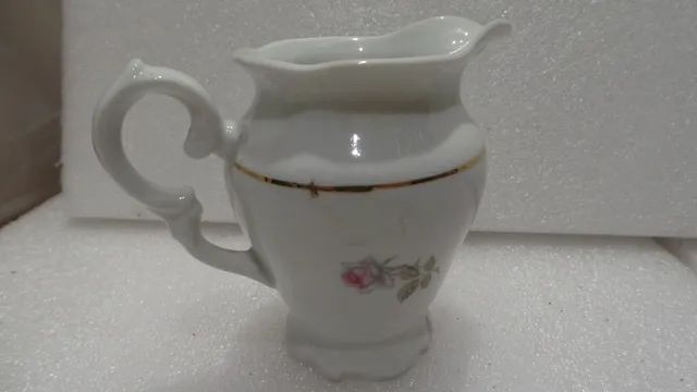 Mini leiteira de porcelana schmidt linda e rara!! medindo 9cm de altura - Foto 6