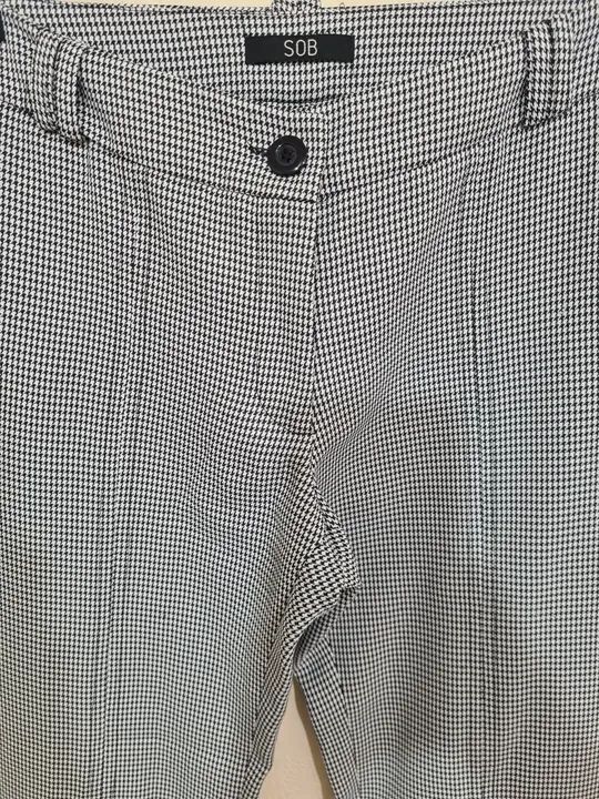 Calça xadrez tam p veste até 38 estado de nova  - Foto 5