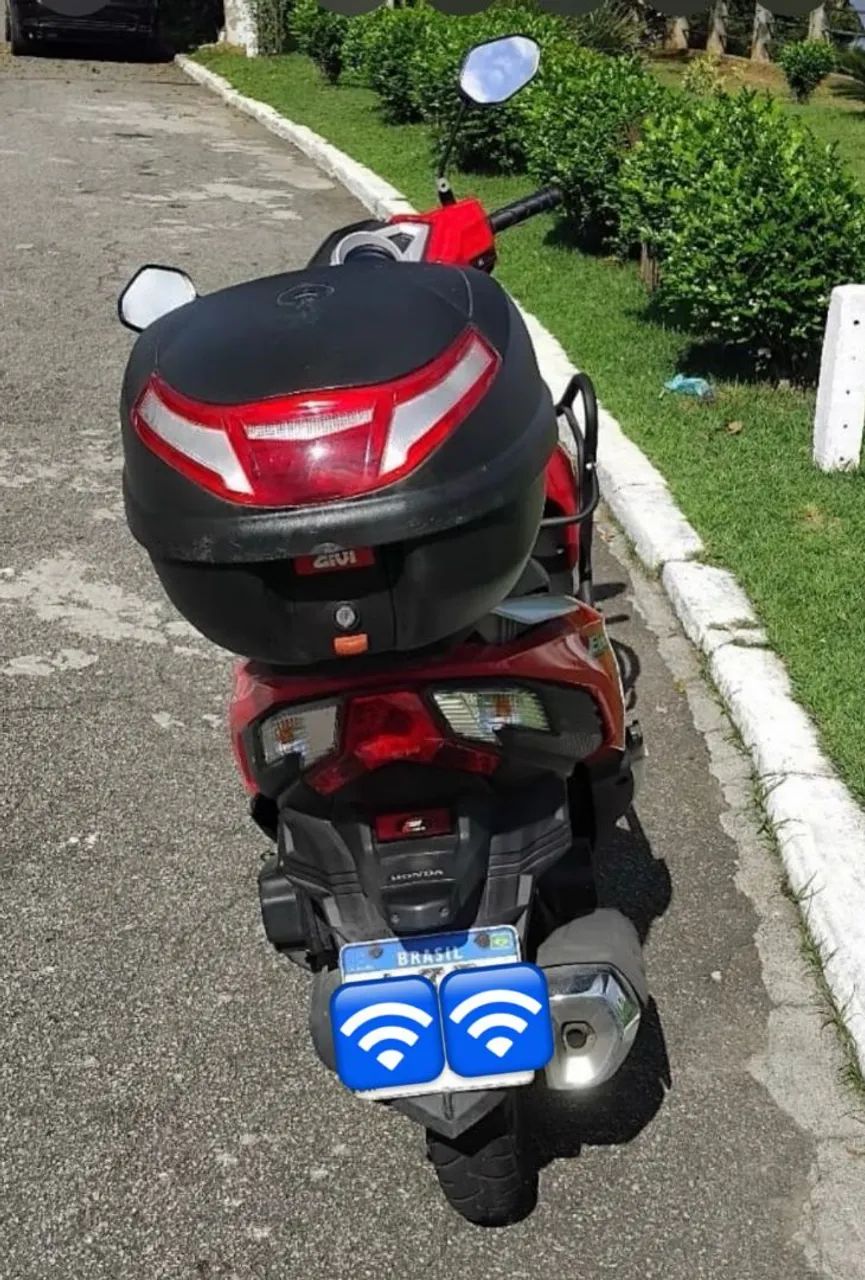 Honda Elite 125 vermelha com acessórios  - Foto 4