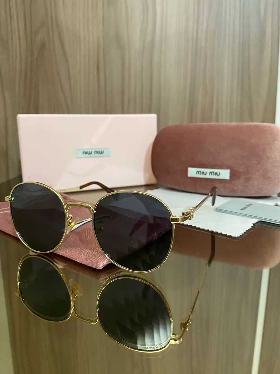 Óculos de sol Miu Miu 