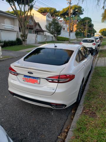 Fusion Baixa km. bem novo