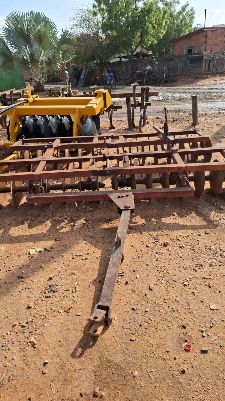 Grade niveladora 32 disco, 