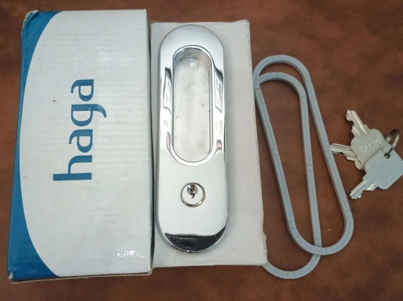 Fechadura Haga Concha com chave (bico de papagaio)