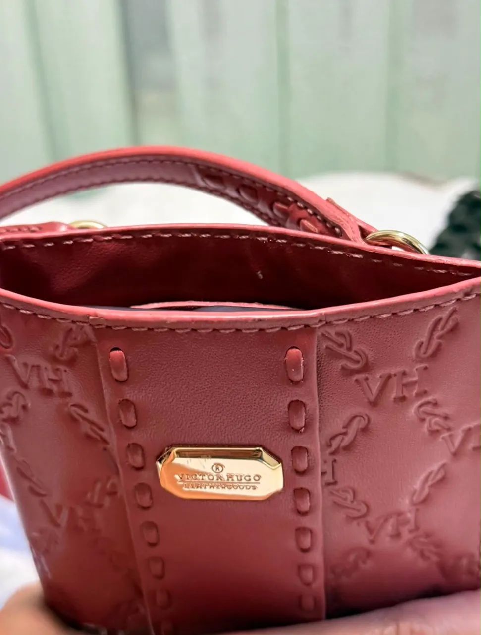 Bolsa porta celular Victor Hugo rosé