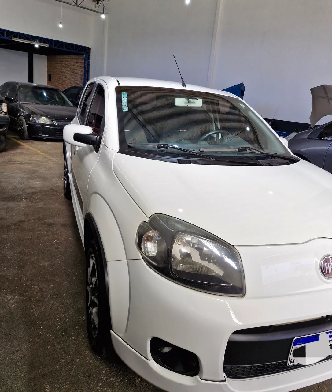Fiat Uno Sporting 1.4 EVO Fire Flex 8V 4P 2013 - Foto 5