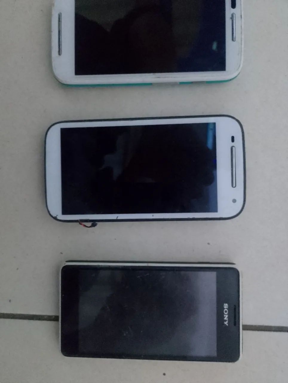 Celular pra reaproveitar peças não sei o defeito..