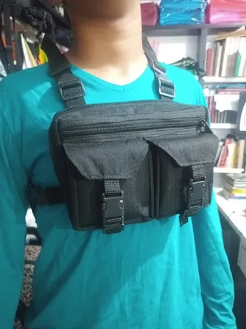 bolsa beg tipo colete ,quatro bolsos e uma divisoria , material ripstop