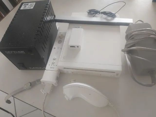 Nintendo Wii + adaptador  HDMI Com cartão SD 30GB com alguns jogos  - Foto 4