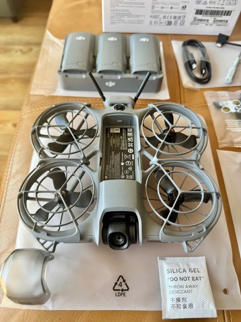 Drone DJI Neo 2 Fly More Combo - Controle sem Tela - Caixa Aberta - NOVO - Foto 2
