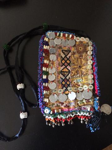 Bolsa pequena com moedas