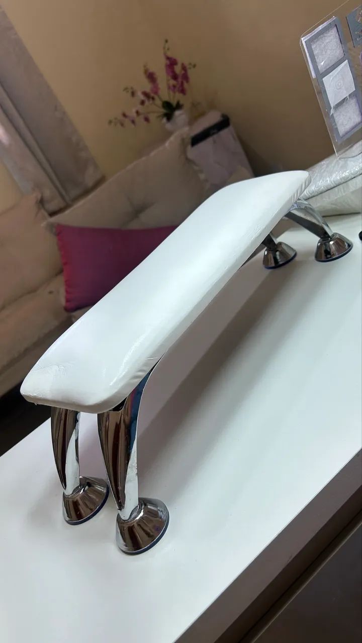 Apoio de mão e aspirador de pó 