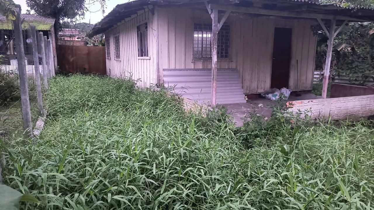 Terreno com casa 