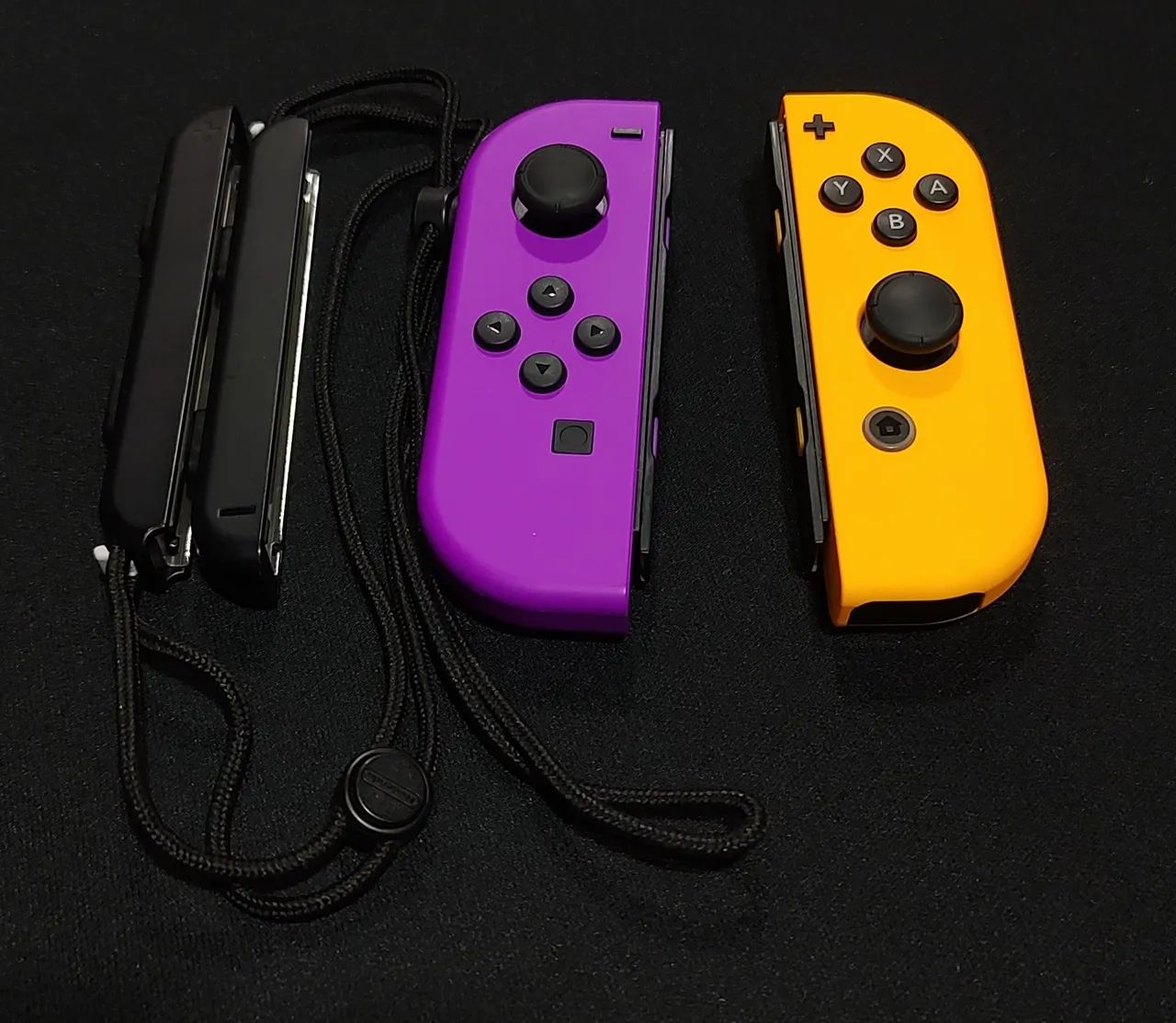 Joy Cons Originais Roxo e Laranja + straps Nintendo  - Foto 4