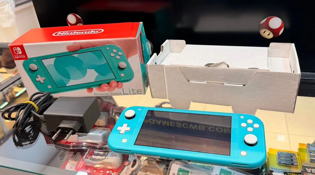 Nintendo Switch Lite Com jogos - Foto 2