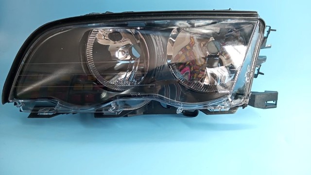 Farol  Serie-3 E46 Ano:1999-2001 Marca:TYC Sedan ?Elétrico Mascara Negra