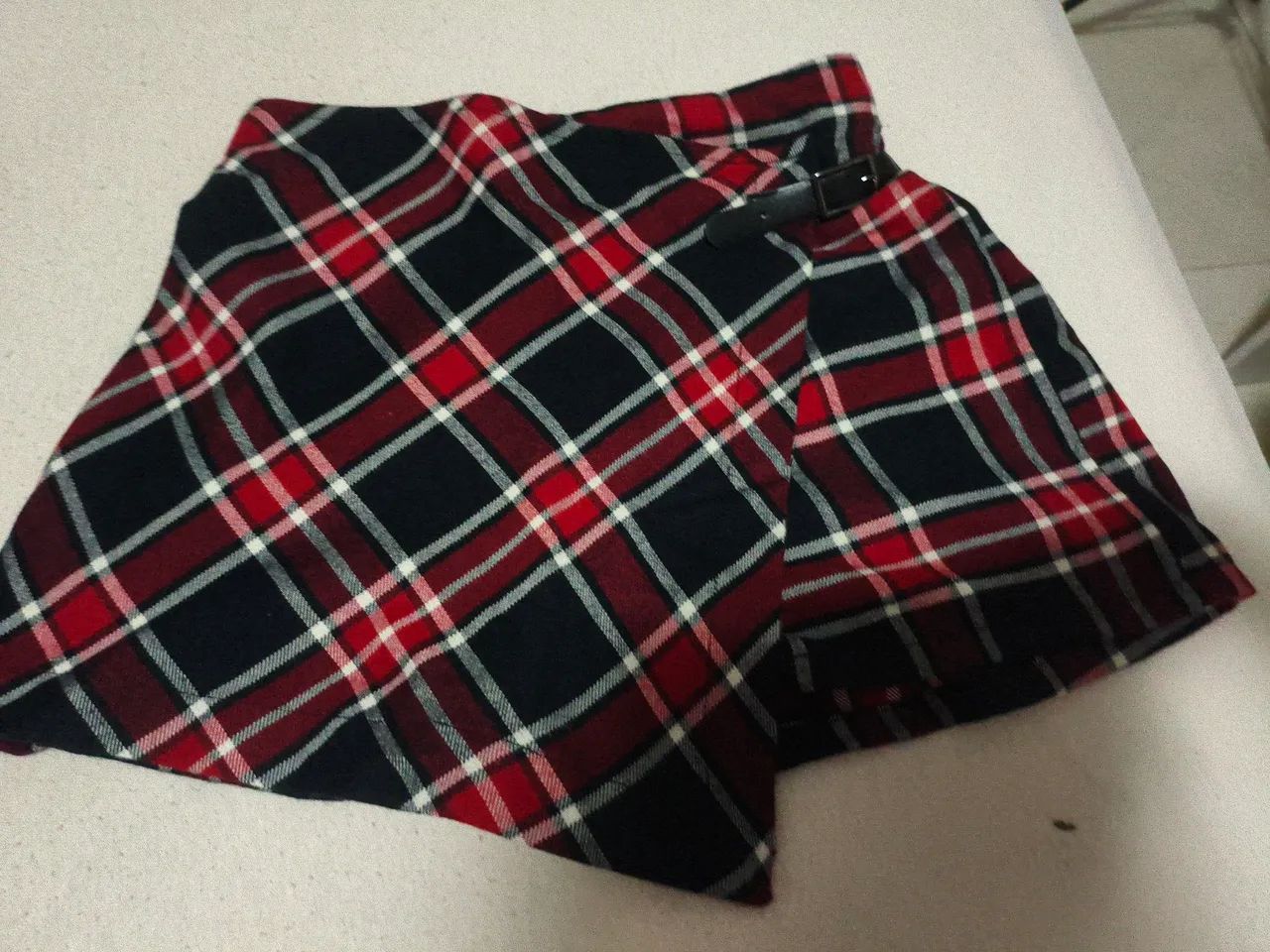 Short saia quadriculado da renner 