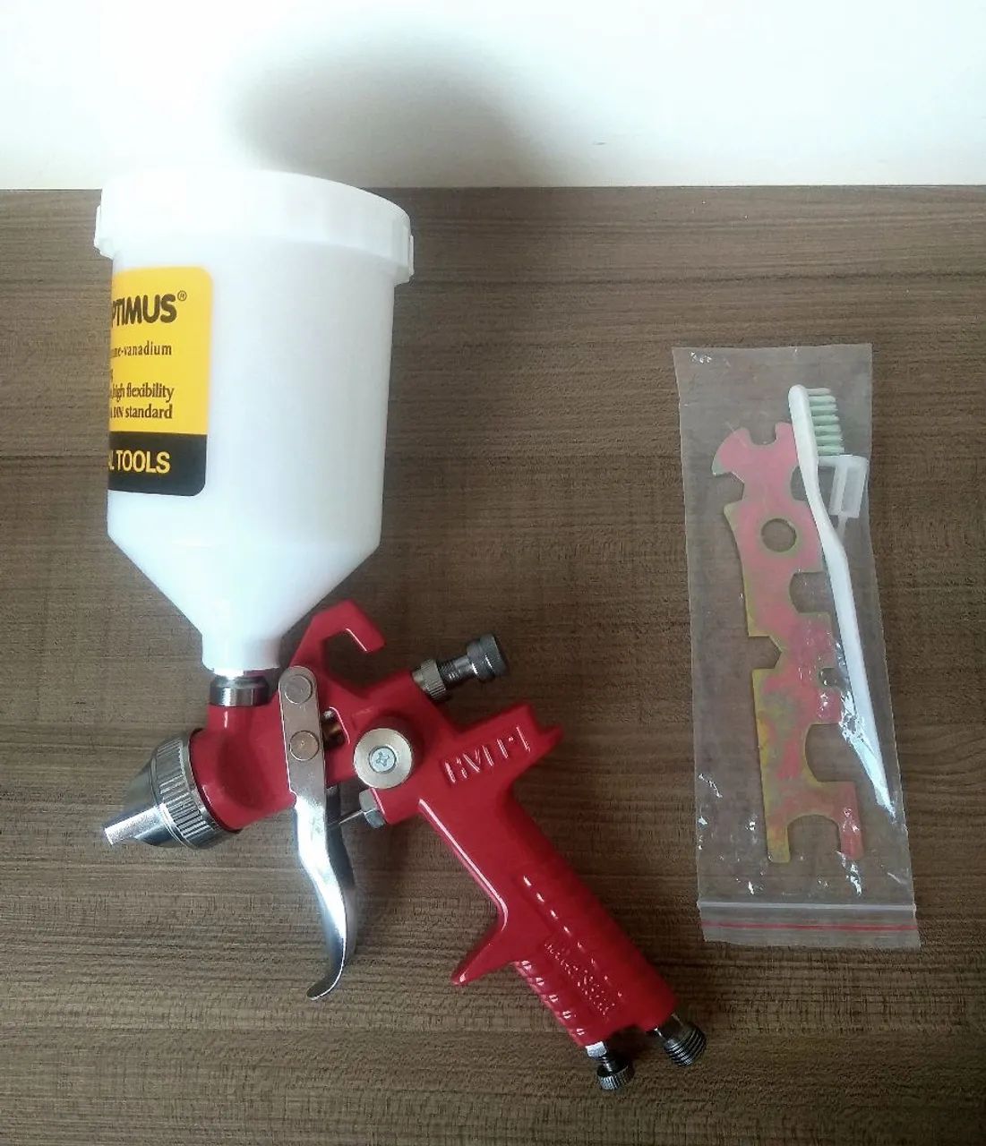Pistola de pintura Gravidade Optimus Hvlp Nova - Foto 3