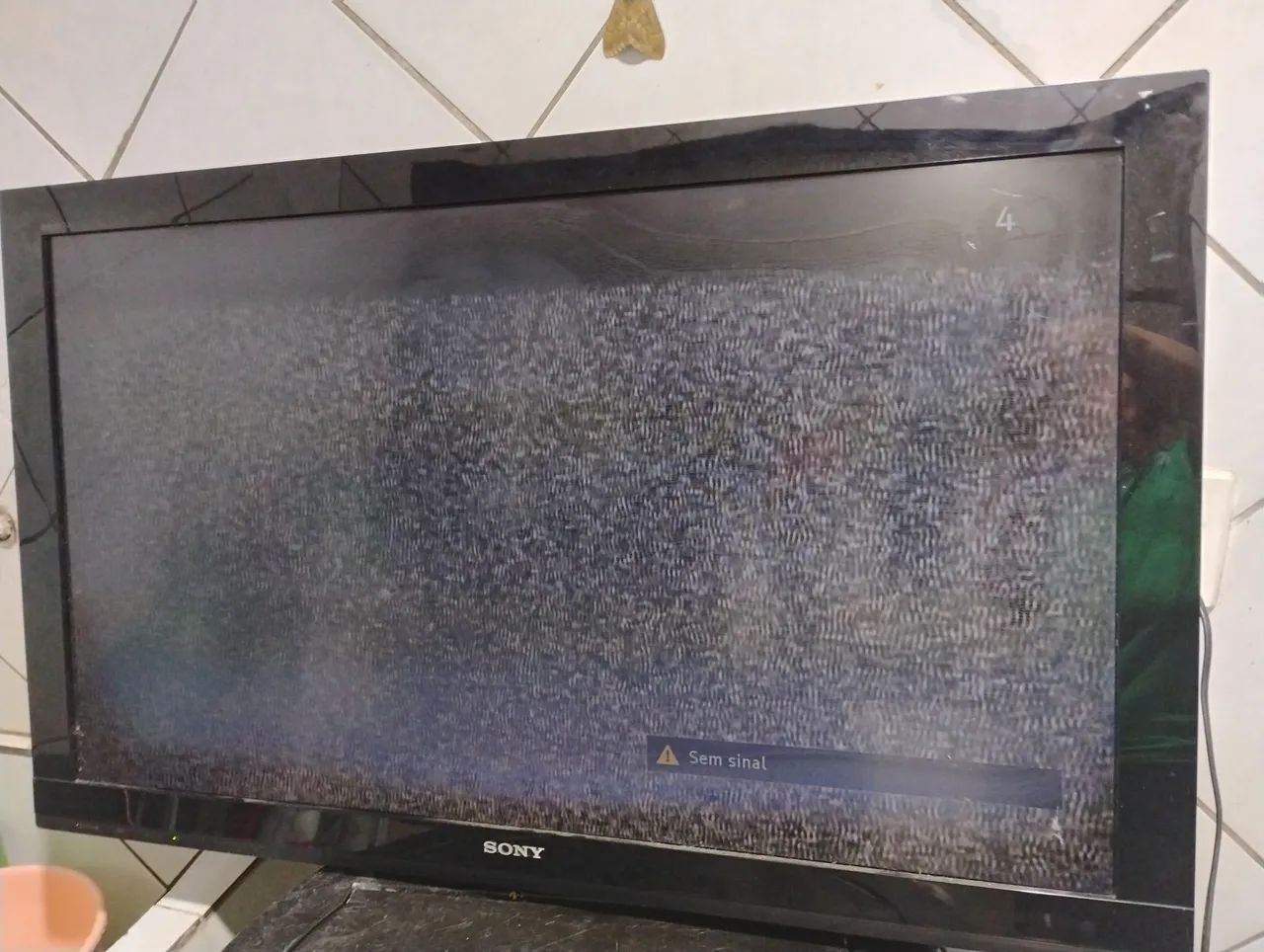 TV to remove parts. Has a spot on the screen but it's still possible to watch64313037816321122
