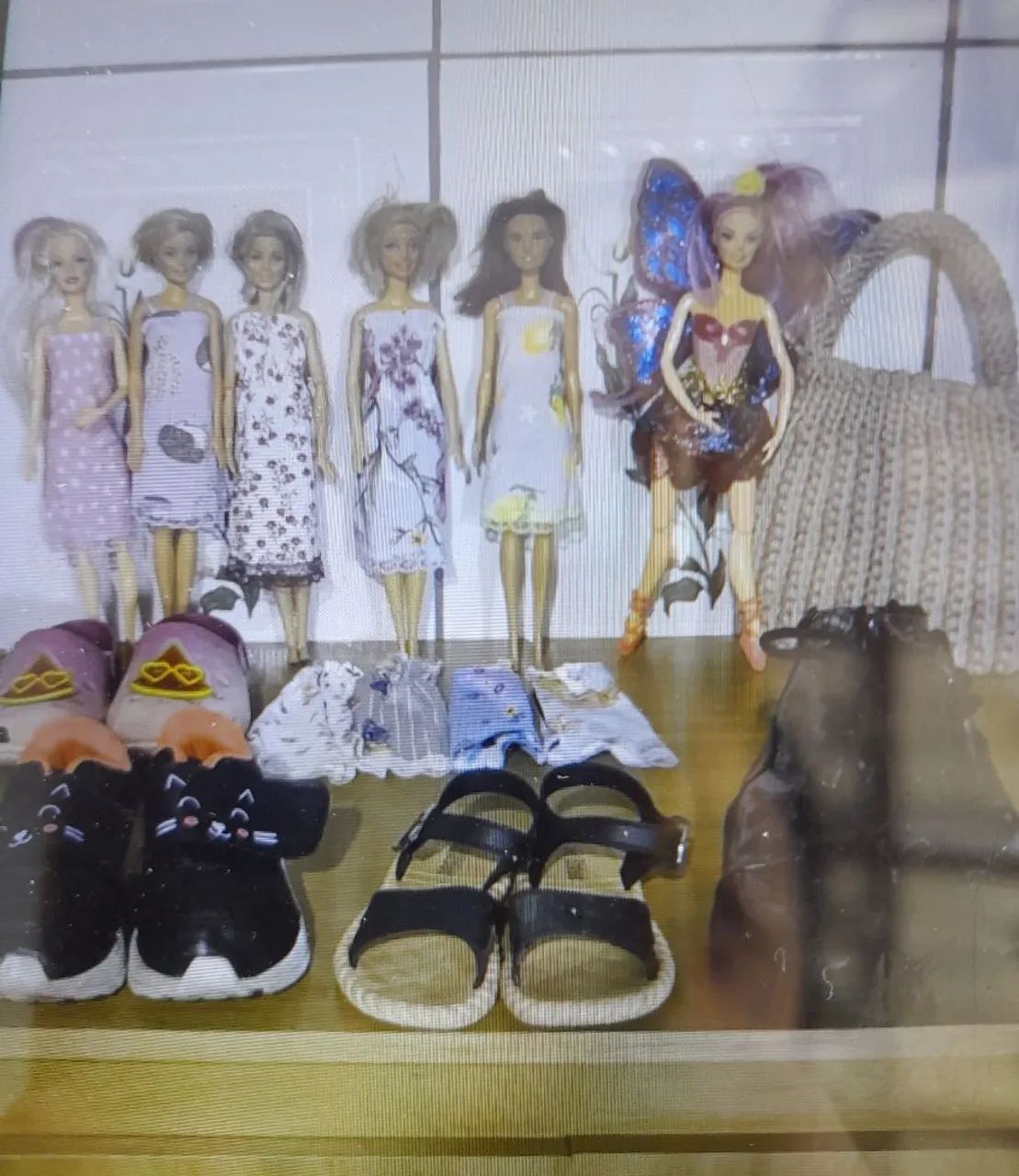 Conjunto de Calcados e bonecas e bolsa kids