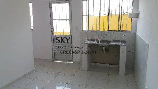 Terreno com 4 casas construidas - renda a venda