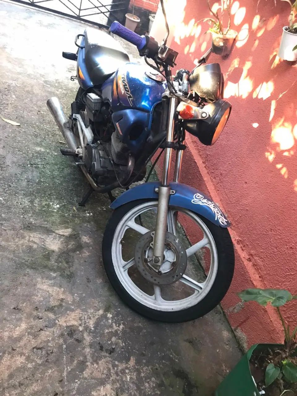 Vendo moto enrolada 