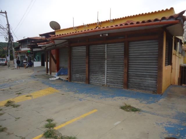 1.930 m2, com 2 Lojas, 1 Casa Grande, 1 Casa de caseiro, 2 Construções pequenas - Foto 4