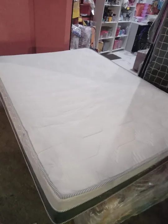 Colchão semi novo Mola ensacada 