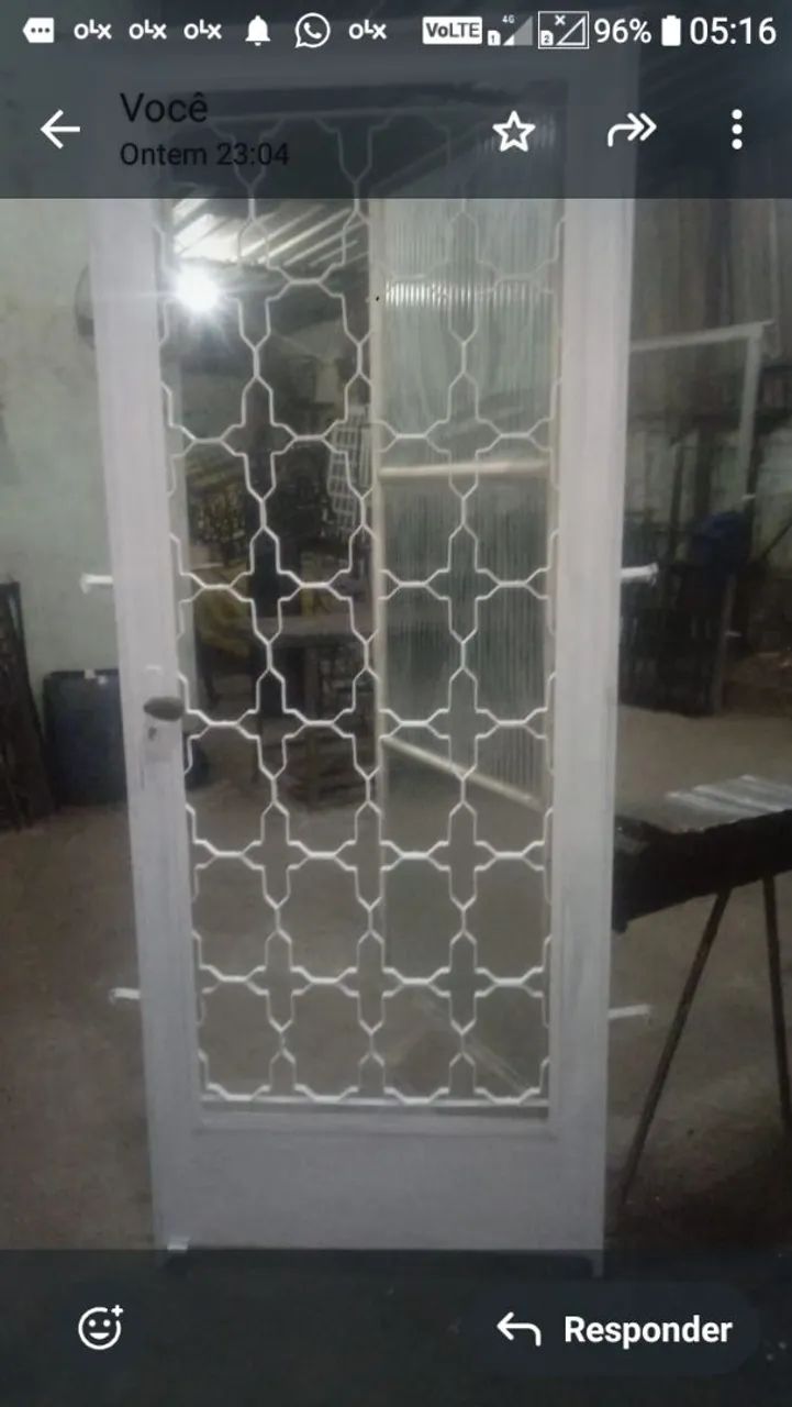 Ornately crafted door with a small side door64750513810946123
