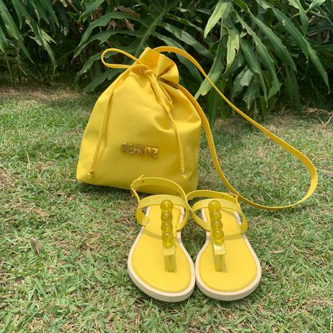 Kit bolsa e chinelos