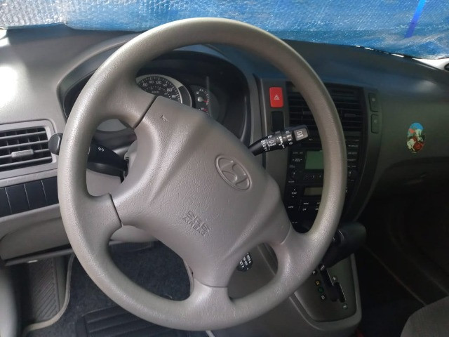 Vendo Tucson completa automática carro de garagem - Foto 9