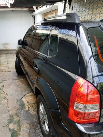 Vendo Tucson completa automática carro de garagem - Foto 8