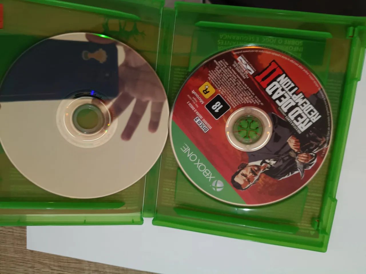 Jogo Red Dead Redemption 2 cd duplo( impecável+ Mapa) - Foto 2