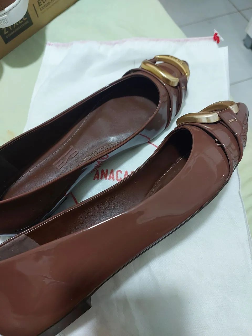 Sapatos não usados