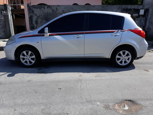 Vendo tiida seminovo cel *
