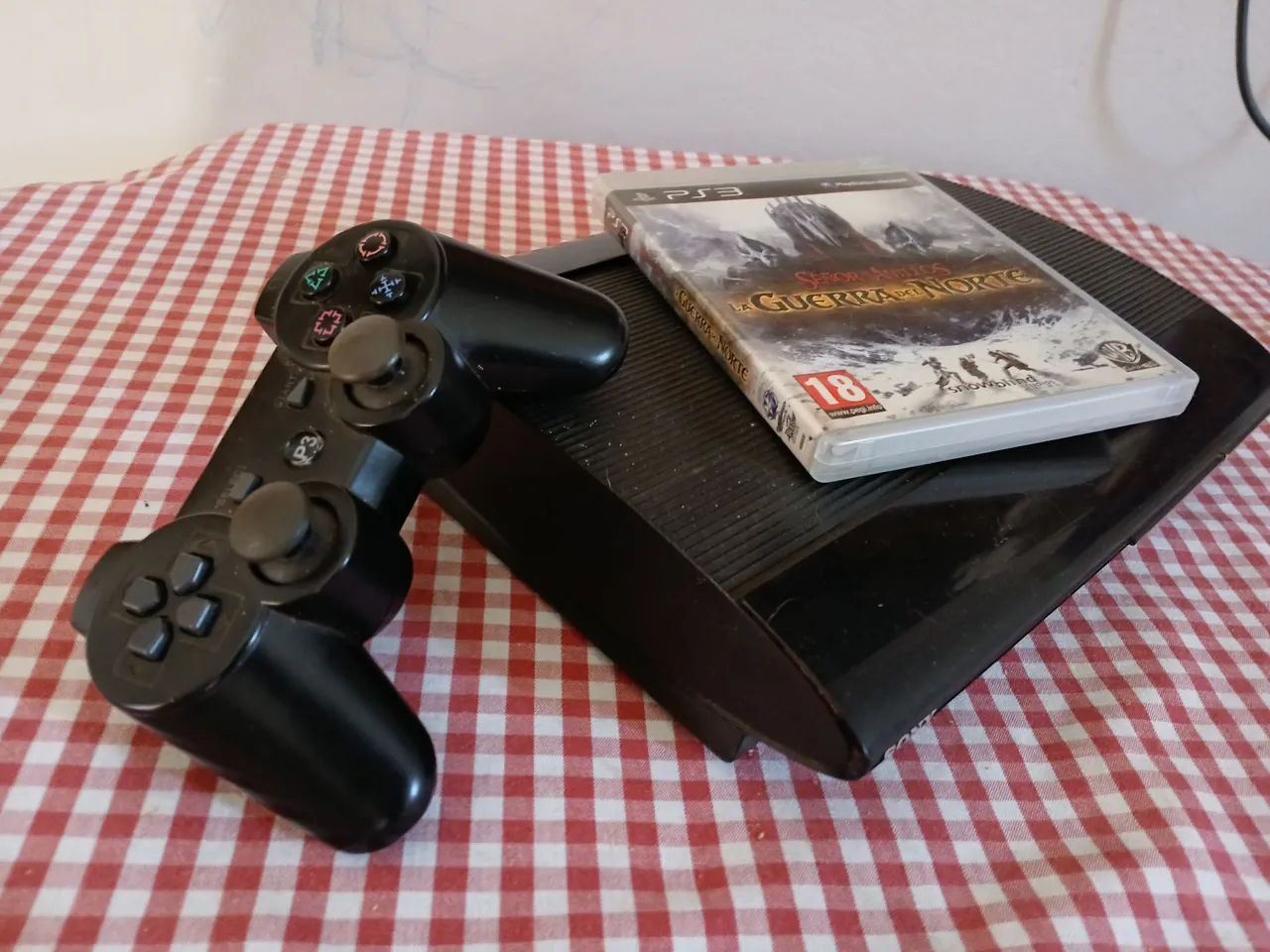 PS3 + Controle + Jogo O Senhor dos Anéis: A Guerra do Norte