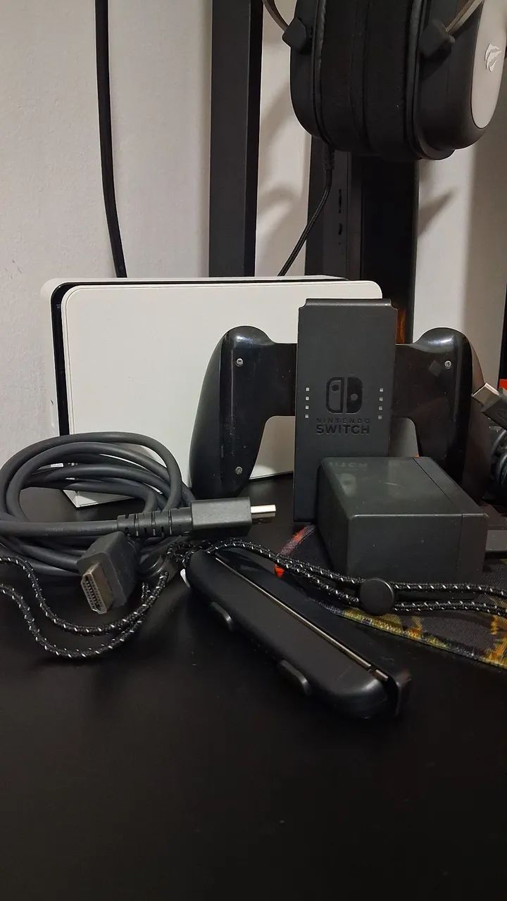 Caixa e acessórios originais de Nintendo Switch Oled Edição Mario Wonder - Foto 5