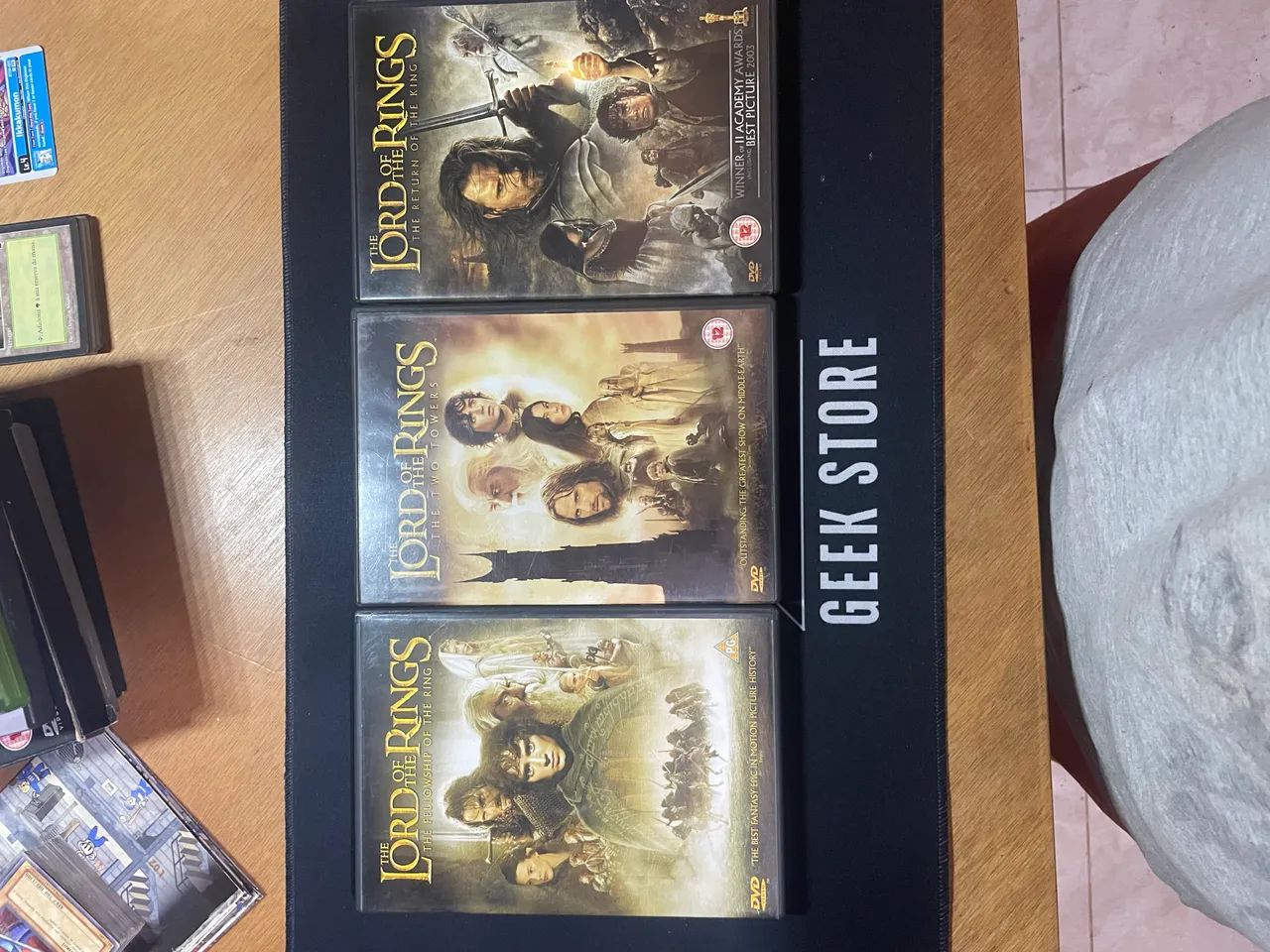 Trilogia de dvds senhor dos anéis originais - Foto 2