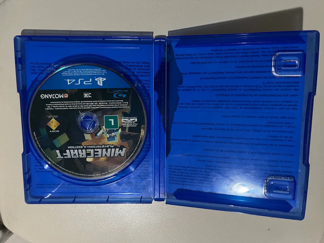 PS4 - 860 GB com 2 jogos (CD) e um controle com problema do L2. - Foto 3