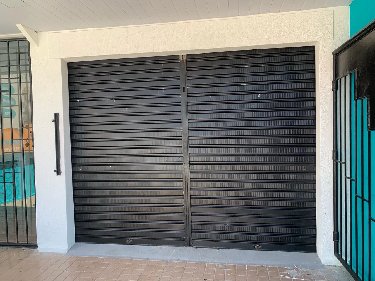 Porta de enrolar de aço - segurança para sua casa - Foto 2