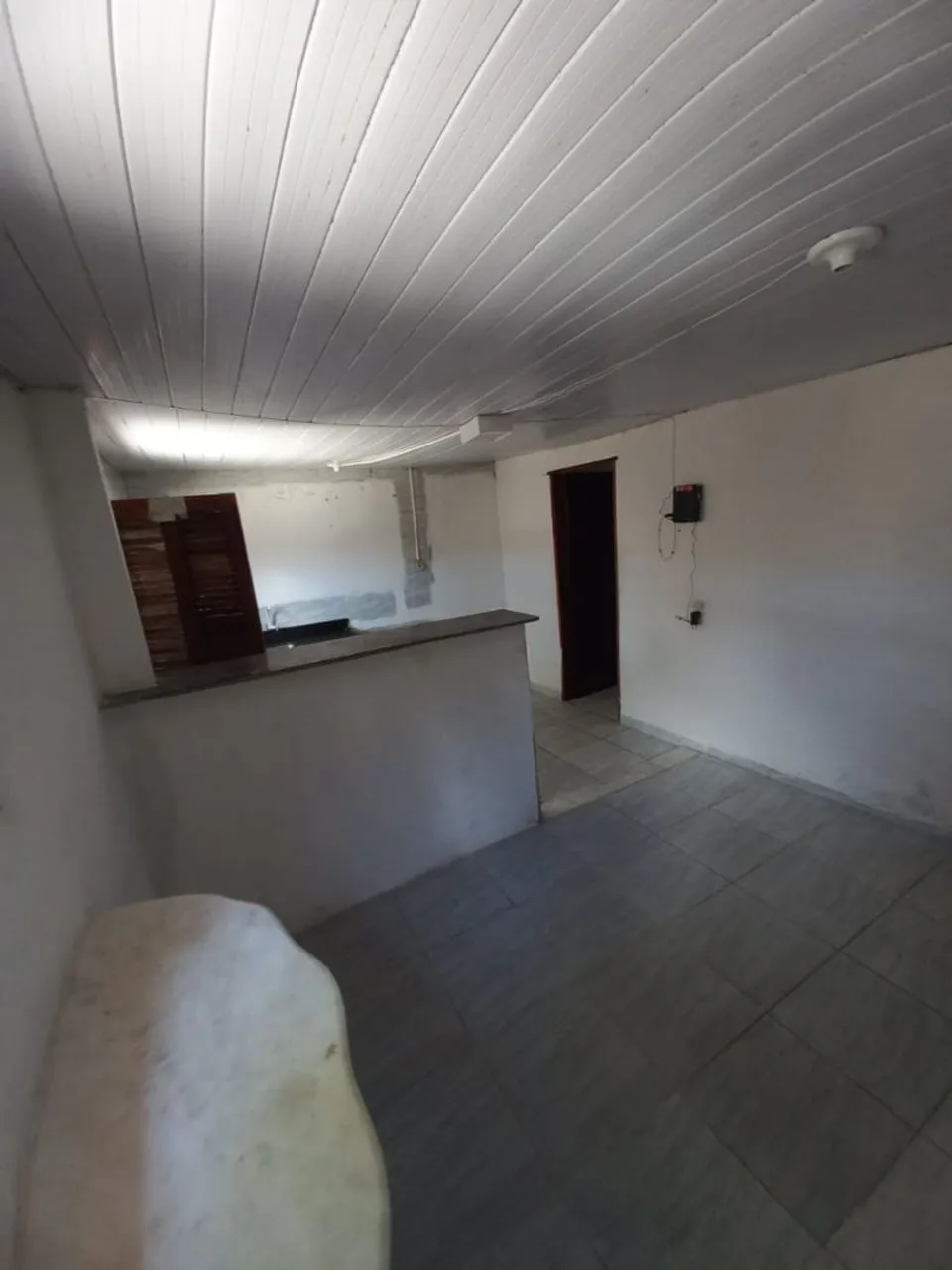 Casa com muro grande