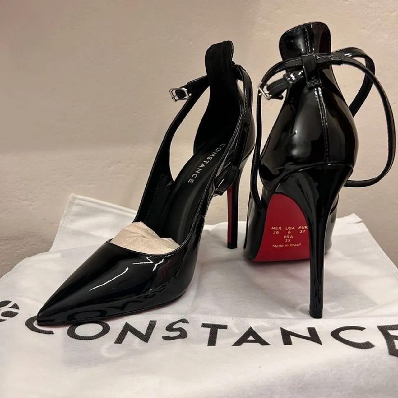 Salto preto de Sola vermelha Constance Calçados Parque dos