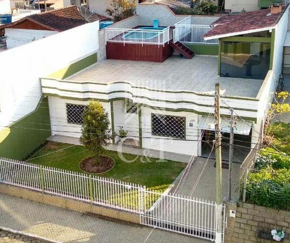 Casa 4 dormitórios (sendo 1suite) + 3 vagas