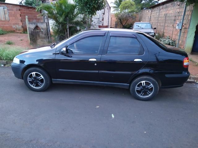 Vendo siena 2004 /04 valor 11.000.00 completo menos direçao tel * - Foto 5