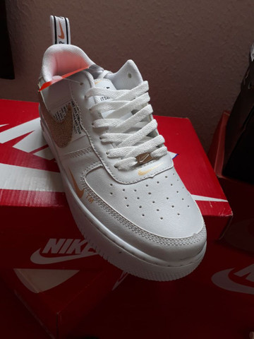 tenis nike dourado com glitter