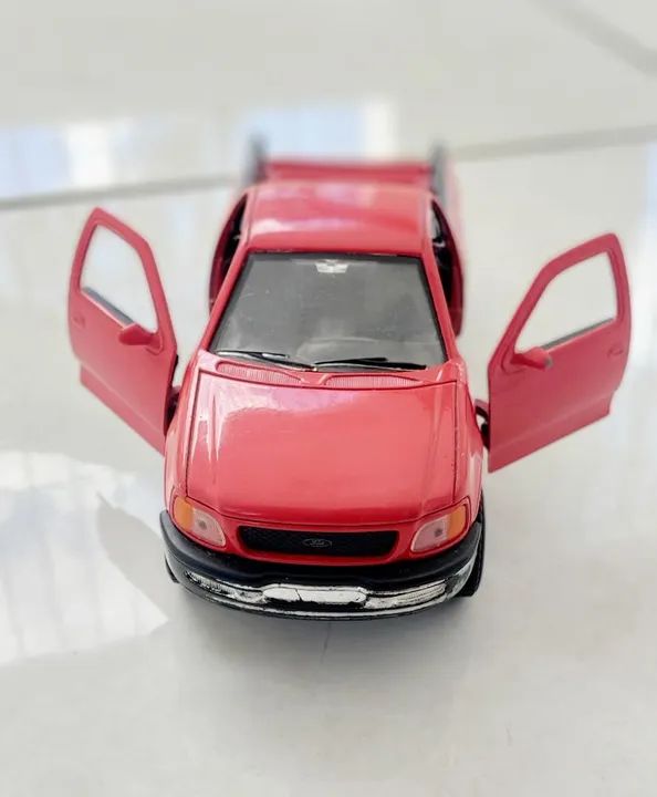 Miniatura Ford F-150 4x4 1998 Welly 1/24 - Foto 4