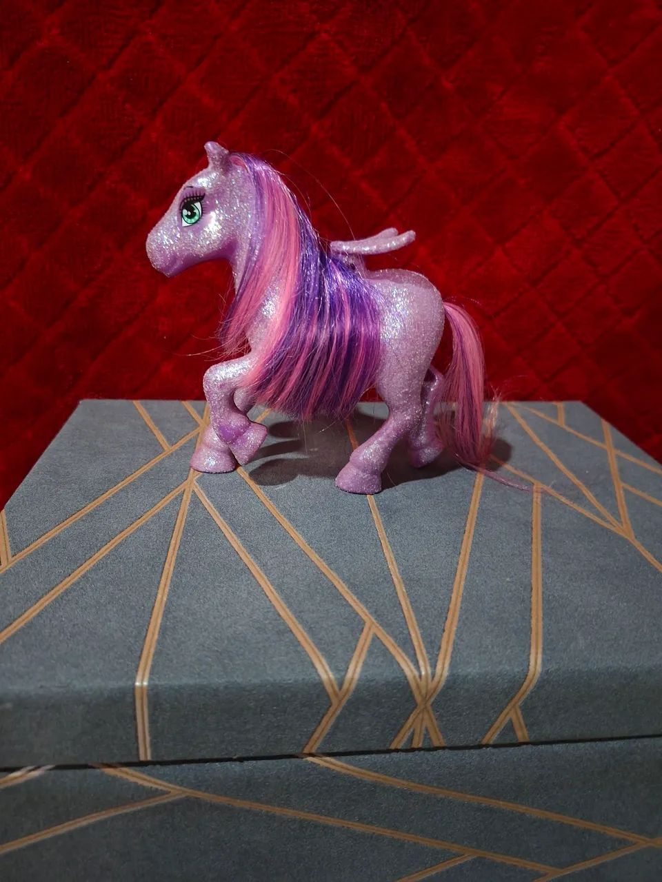 Poney roxo com gliter mattel. 