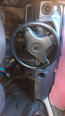 Vendo ou troco por carro já financiado pra mim assumir - Foto 6