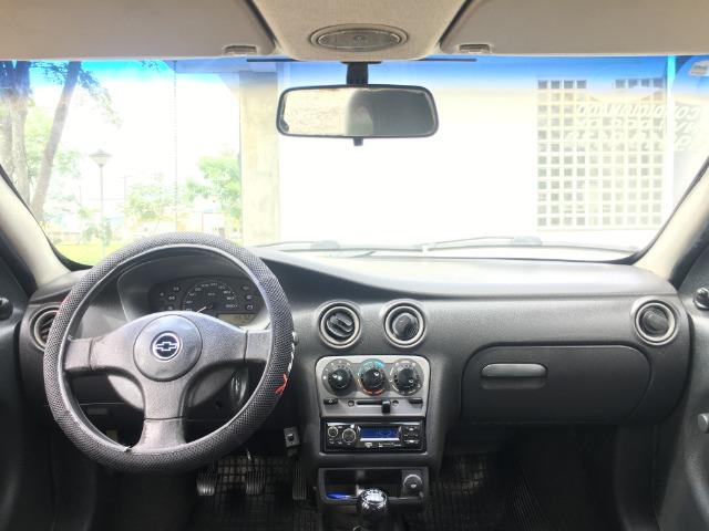 Celta 1.0 spirit 4p com 145000 km com ar , gnv e doc ok! - Foto 4