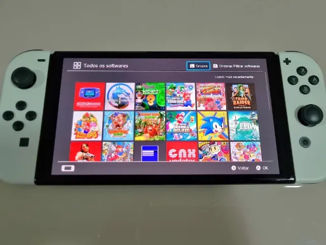 Switch OLED Desbloqueado, 256GB, case e fonte.